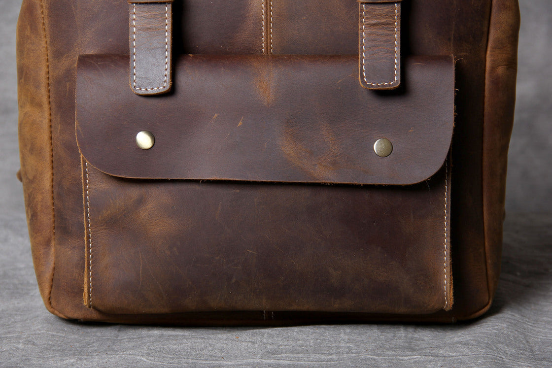 worn leather hiking backpack
