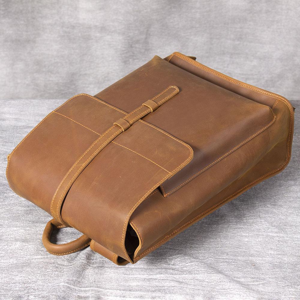 well made executive backpack cowhide leather with quilted laptop sleeve to carry your macbook and ipad tablet