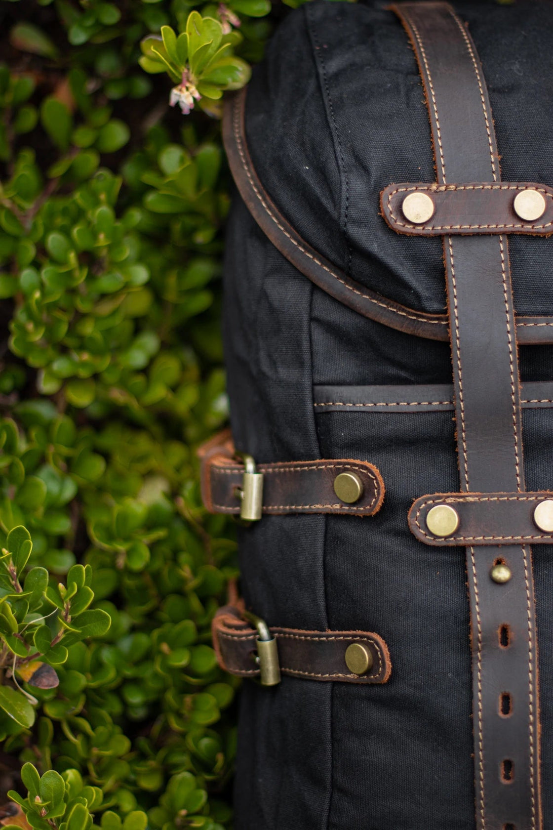Black Rostock old fashioned rucksack with sturdy YKK zippers, cotton webbing and full-grain leather closures