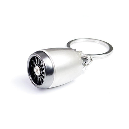 Silver keychain with black interior on a white background