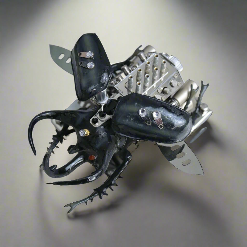 Metallic beetle toy with black and silver details on a white background, Diyion mechanical model kit DIY assembly engineering educational toy