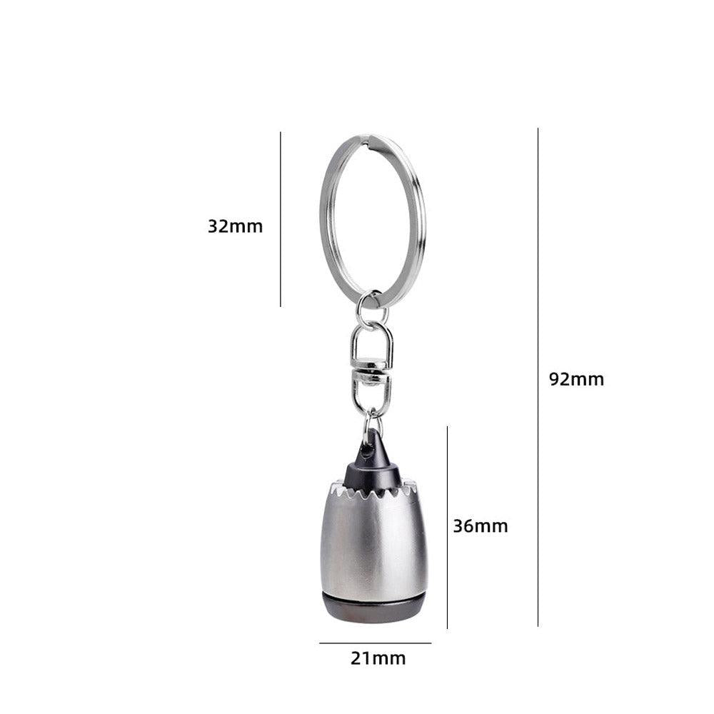 Silver keychain with dimensions labeled on a white background