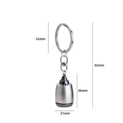 Silver keychain with dimensions labeled on a white background