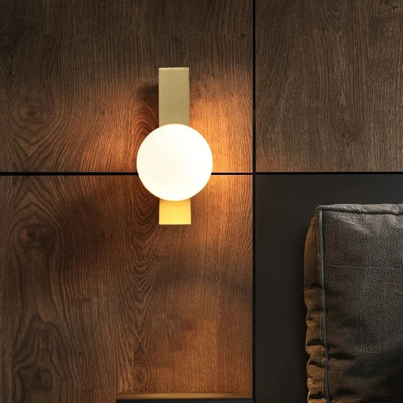 GildedLume – Wall Light with Golden Glass Sphere