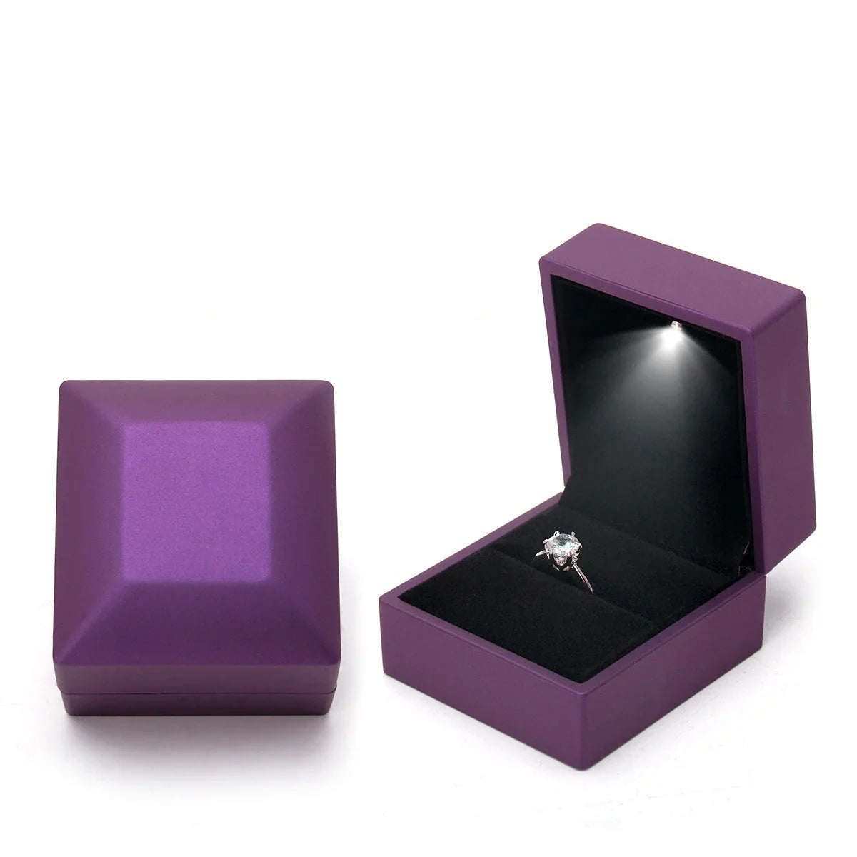 Purple jewelry box with a ring inside on LED ring box with automatic light for engagement proposals and wedding jewelry display