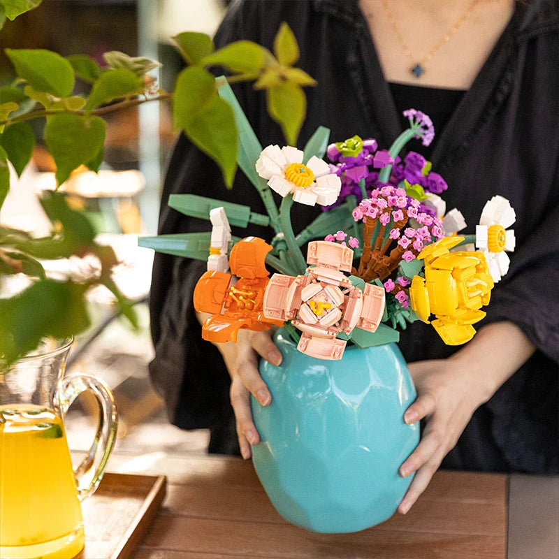 DIY flower building blocks set with colorful pieces and assembled bouquet display for creative construction and home decoration