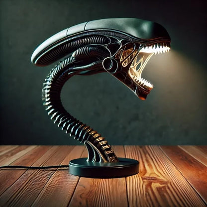Alien lamp with glowing mouth on a wooden surface - Unique alien creature resin lamp stand for modern home decor