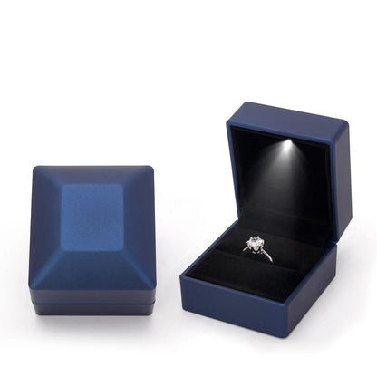 Blue jewelry box with a ring LED ring box with automatic light for engagement proposals and wedding jewelry display