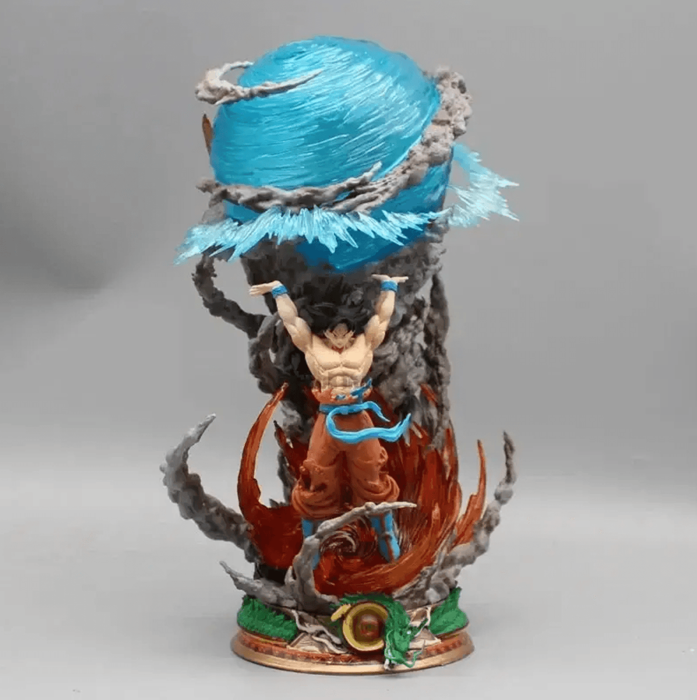 23cm Diyion Goku figurine depicting the Spirit Bomb technique with a base detailed with battle debris