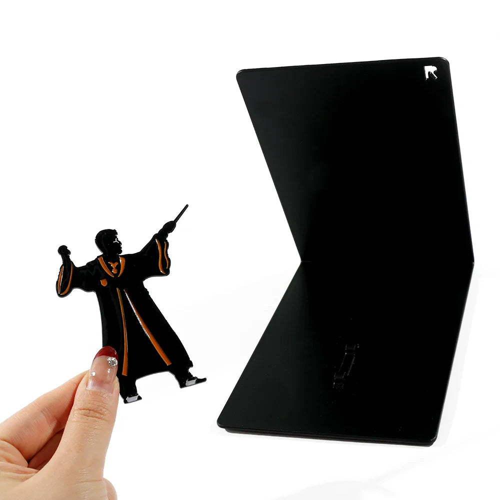 Harry Potter black book holder with metal character design for a themed shelf display