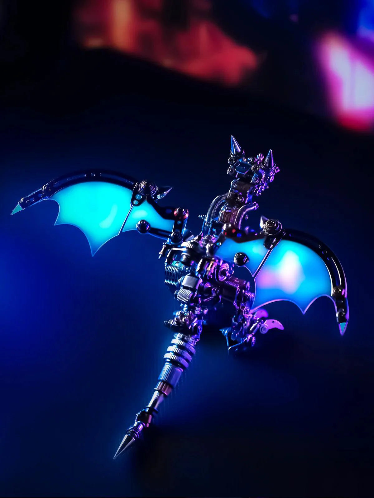 Completed Diyion 630-piece metal dragon puzzle as a fantasy display model for a desk or shelf