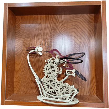 Mechanical dragon model with gears on a wooden shelf Diyion | Kinetic Hummingbird Sculpture - 3D Wooden Mechanical Puzzle Kit