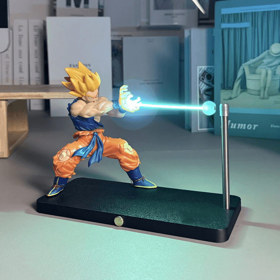 PLA and metal Goku collectible with concealed magnets suspending the illuminated energy beam