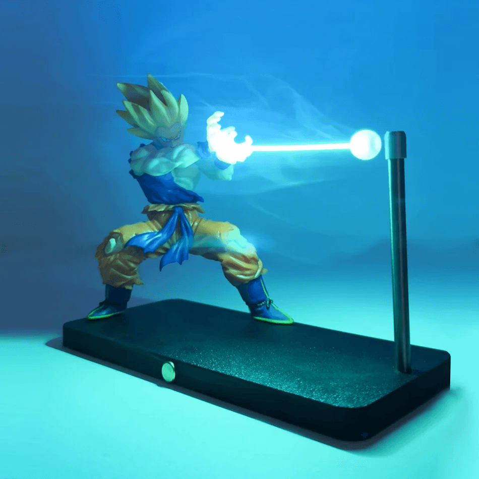 Dragon Ball Goku desk display with a removable magnetic energy beam and blue LED illumination