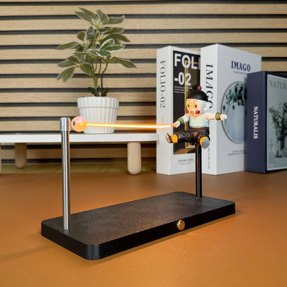 Chiaotzu Dodonpa LED figurine with warm yellow and orange magnetic energy beam